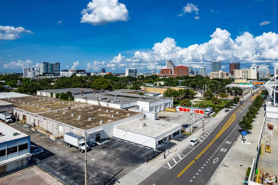Aerial over 777 West Central Boulevard in Orlando, the four bays of the building and the downtown skyline beyond.