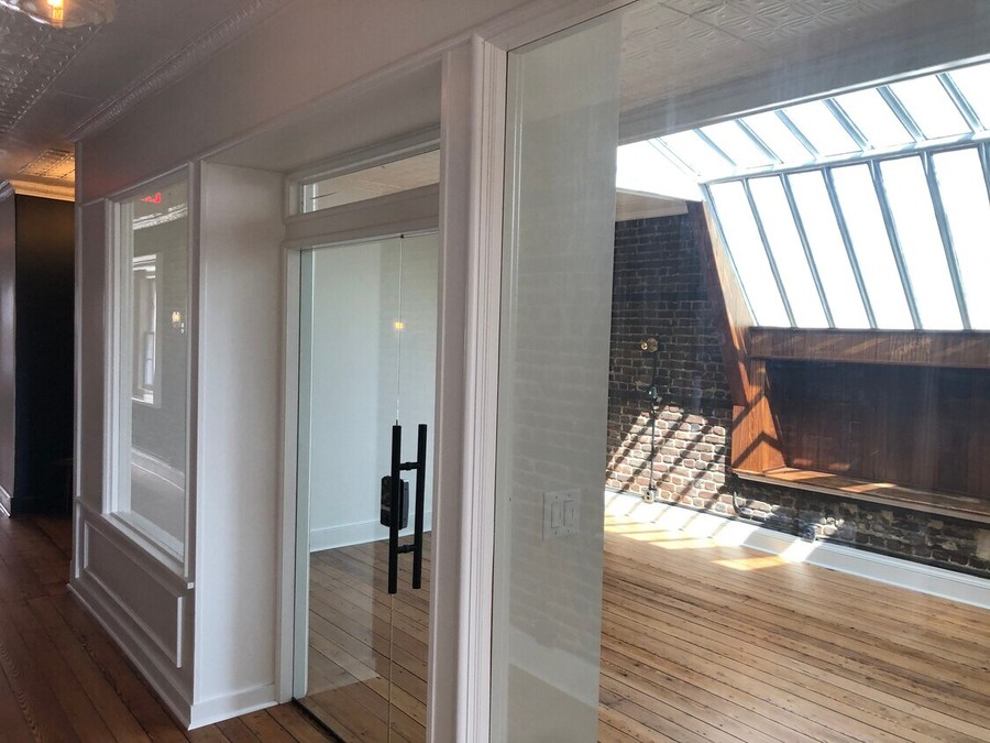 A skylit office under the original roof on King Street.