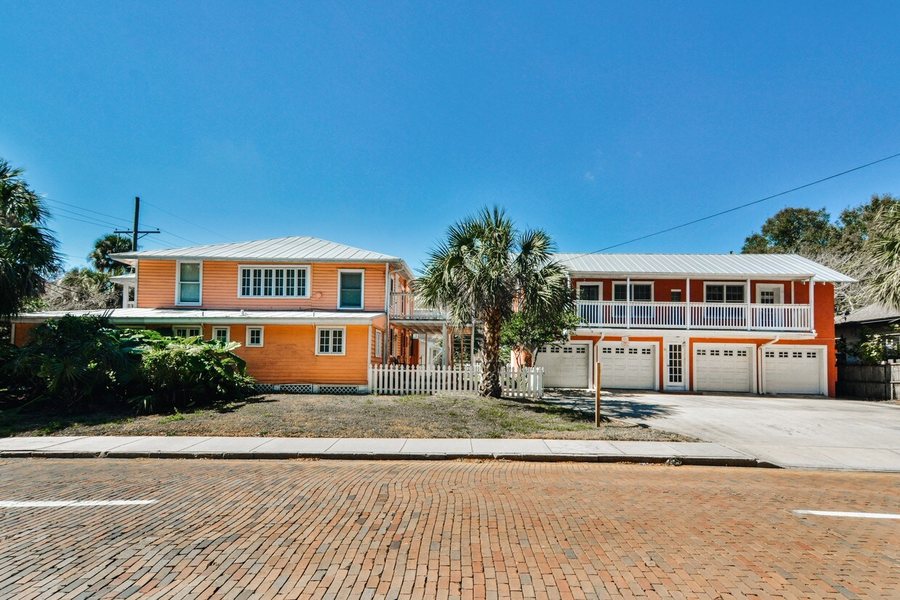 The garage block on the brick street behind Thornton Park.